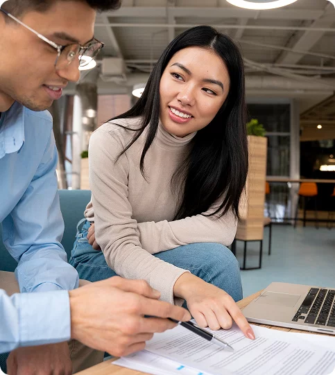 Xionnix team reviewing documents together.