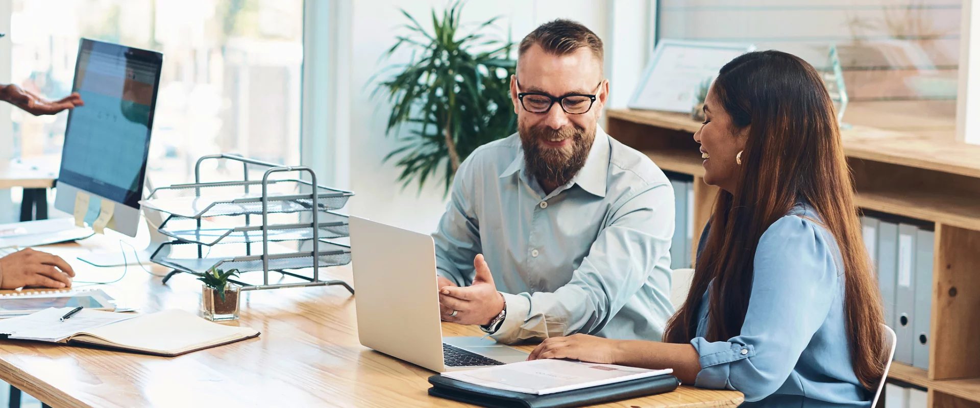 Xionnix co-workers in a productive business discussion.