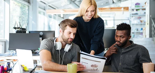 Xionnix creative team celebrating graphic designing success