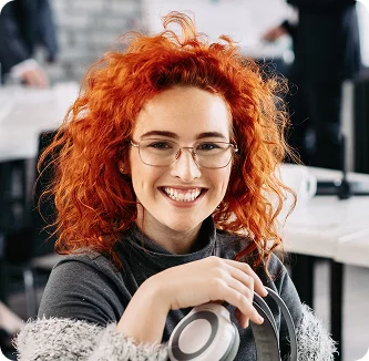Xionnix developer smiling at workplace