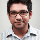 Smiling man with glasses, Xionnix SEO services